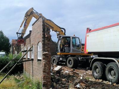 Sllopwerk van woningen, aanbouwen, bedrijfspanden en schuren